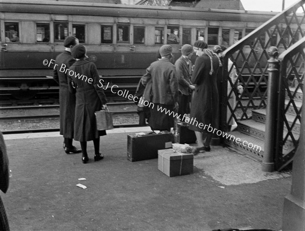 GIRLS AT RAILWAY STATION